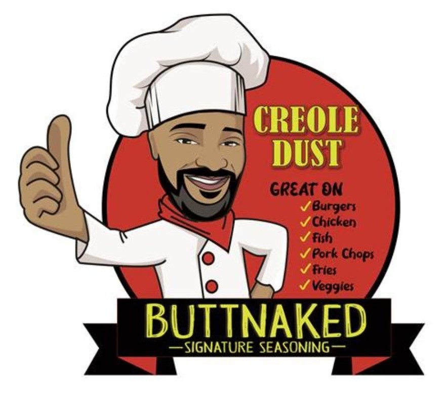 A chef with a beard and mustache giving the thumbs up.